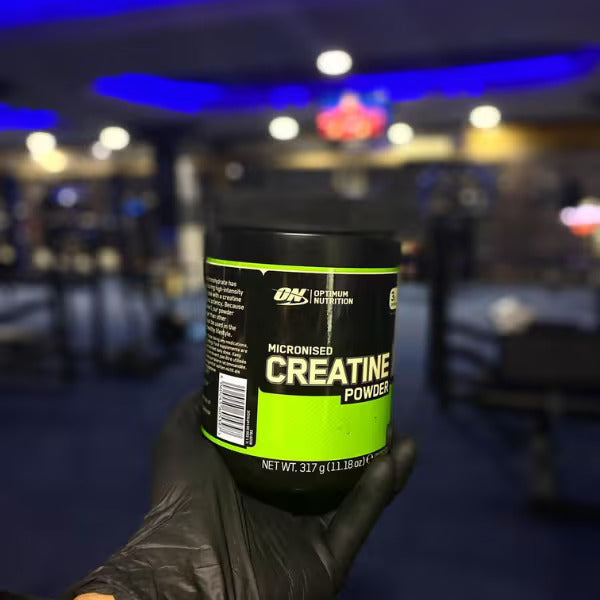 Optimum Nutrition Micronized Creatine in use