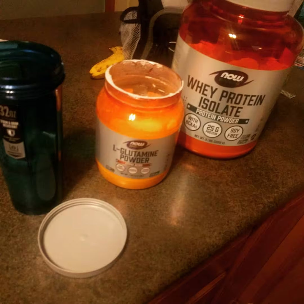 NOW Sports Nutrition Whey Protein Isolate in use