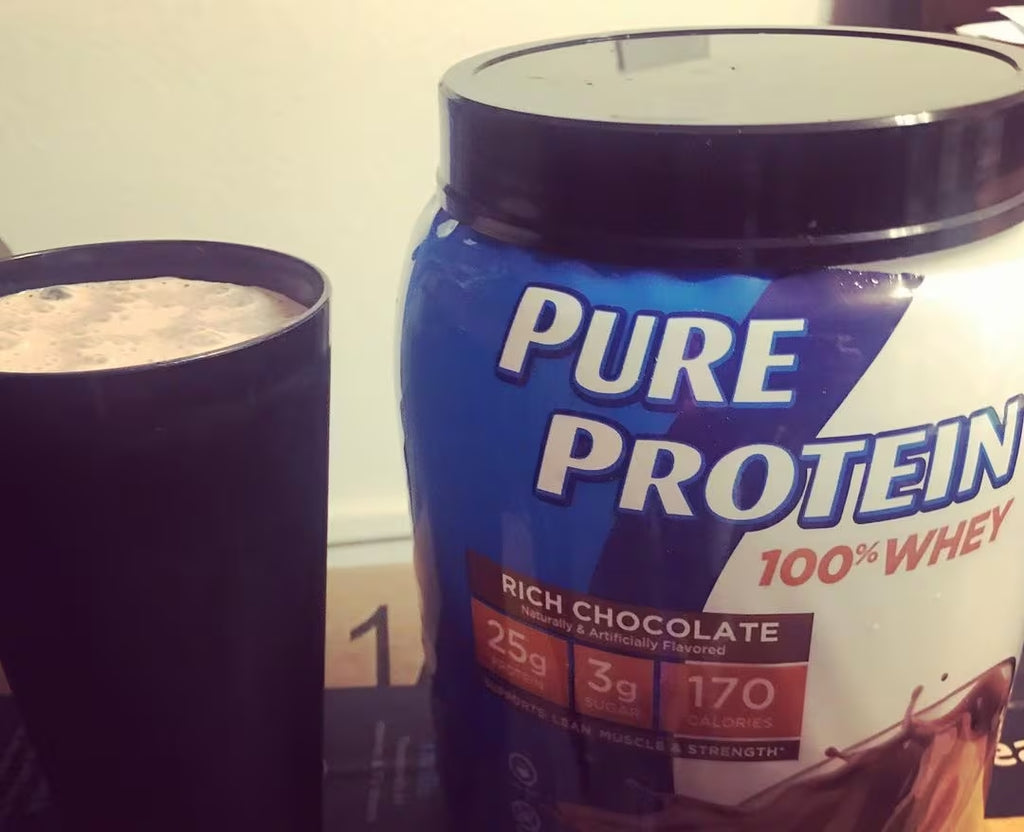 Pure Protein Powder 100% Whey in use